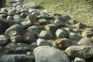 Stones in park. Slide of stones. Artificial waterfall. photo