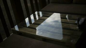 Glass on table. Interior details. Craft table. photo