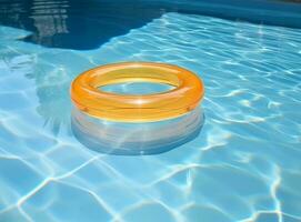 A blue bottom swimming pool with blue water below a large yellow rafting in the mid photo