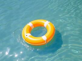 A blue bottom swimming pool with blue water below a large yellow rafting in the mid photo