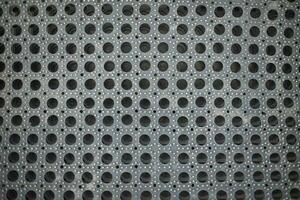 Rubber mat. Texture of machine mat. Surface for collecting dirt from boots. photo