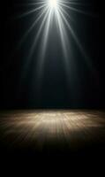 Empty dark stage with spotlight ad wooden floor photo