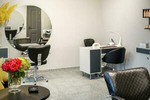 Interior of modern bright hair salon, manicure salon, or beauty salon. photo