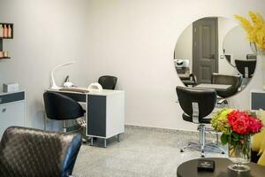 Interior of modern bright hair salon, manicure salon, or beauty salon. photo