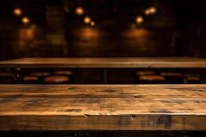 An empty wooden counter table top for product display in a bar or pub. . photo