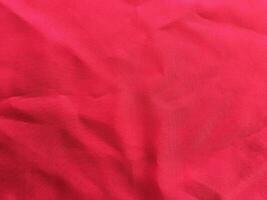 Close up of a red fabric textile texture photo