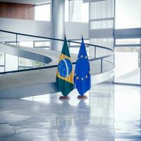 Brasilia, Brazil, June 2023 - Brazil and European Union flag on a building with bright light and beautiful staicase photo