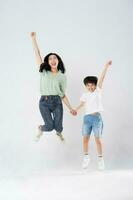 mother and son posing on a white background photo