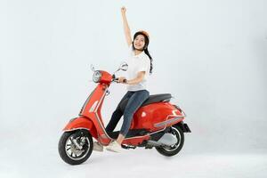 full body photo of a woman wearing a hairdresser and driving a motorbike