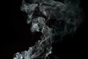 white smoke on black background photo