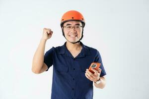 man wearing orange helmet on white background photo