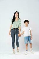 mother and son posing on a white background photo