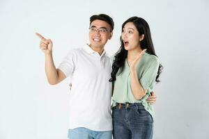 a couple posing on a white background photo