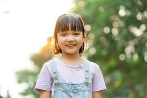 cute asian girl portrait in the park photo