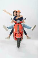 image of asian couple riding scooter on white background photo