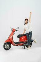 full body photo of a woman wearing a hairdresser and driving a motorbike