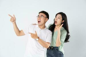 a couple posing on a white background photo