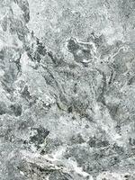 The texture of the stone. Scuffs. Stone background. photo