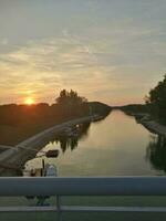 Sunset in Gyor photographed from the bridge photo