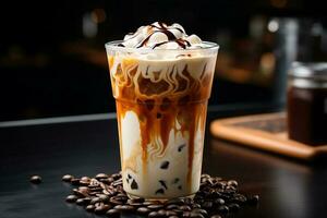 Iced Coffee Latte with Milk Mixture and Cream Topping Chocolate Sauce Served in Clear Glass photo