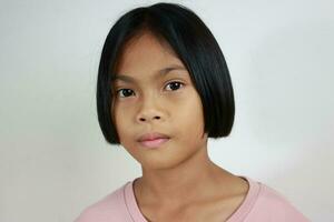 Portrait of child on the grey background photo