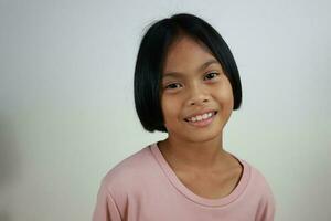 Portrait of child on the grey background photo