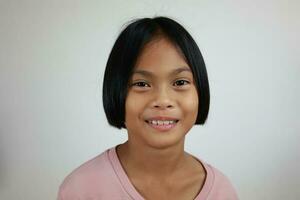 Portrait of child on the grey background photo