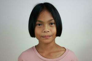 Portrait of child on the grey background photo