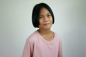 Portrait of child on the grey background photo