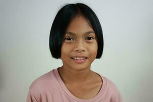 Portrait of child on the grey background photo