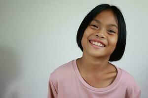 Portrait of child on the grey background photo