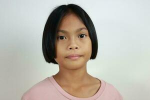 Portrait of child on the grey background photo