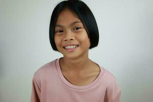 Portrait of child on the grey background photo