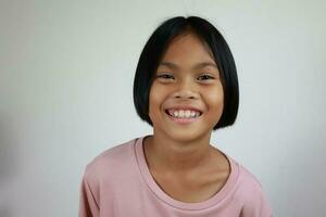 Portrait of child on the grey background photo