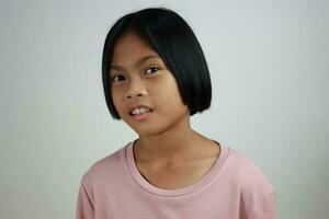 Portrait of child on the grey background photo