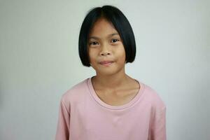 Portrait of child on the grey background photo