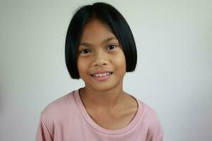 Portrait of child on the grey background photo