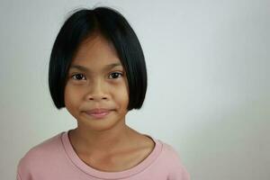 Portrait of child on the grey background photo