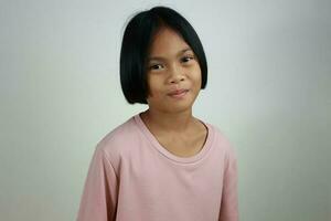 Portrait of child on the grey background photo