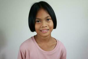 Portrait of child on the grey background photo