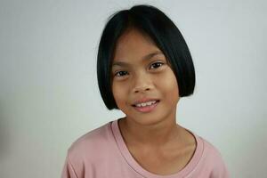 Portrait of child on the grey background photo