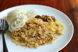 Nasi Goreng Spicy, Fried Rice with Kerupuk Shrimp Crackers photo