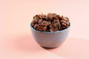 A Bowl of Cereal with Chocolate Flavour for Children Breakfast photo
