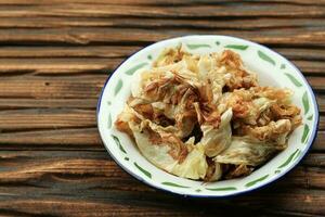 Fried Cabbage or Kol Goreng, Deep Fried White Cabbage Usually Served as Side Dish photo