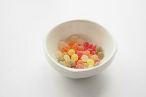 colorful candy sweet jelly in a bowl on table photo