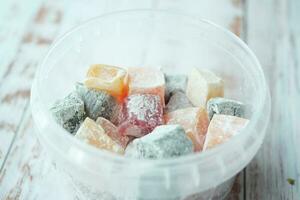 turkish delight or lokum of red, green, orange and yellow colors. photo