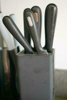 Set of kitchen knives in a box . photo