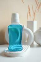 mouthwash liquid in a container on table photo