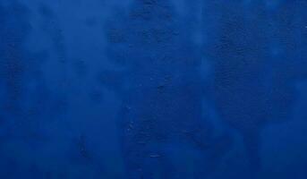 Beautiful Abstract Grunge Stucco Wall. Dark blue background photo