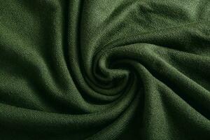 Dark green cashmere fabric close up. photo